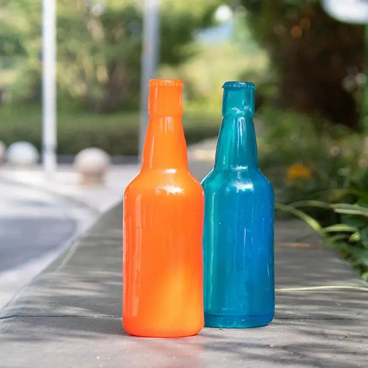 Jouet Distributeur de Friandises pour Chien en forme de bouteille d'eau - HautePattes